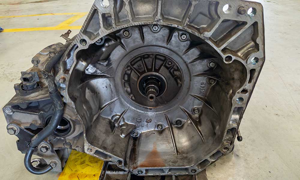 Automatic transmission or automatic transaxle being repaired at an auto repair shop